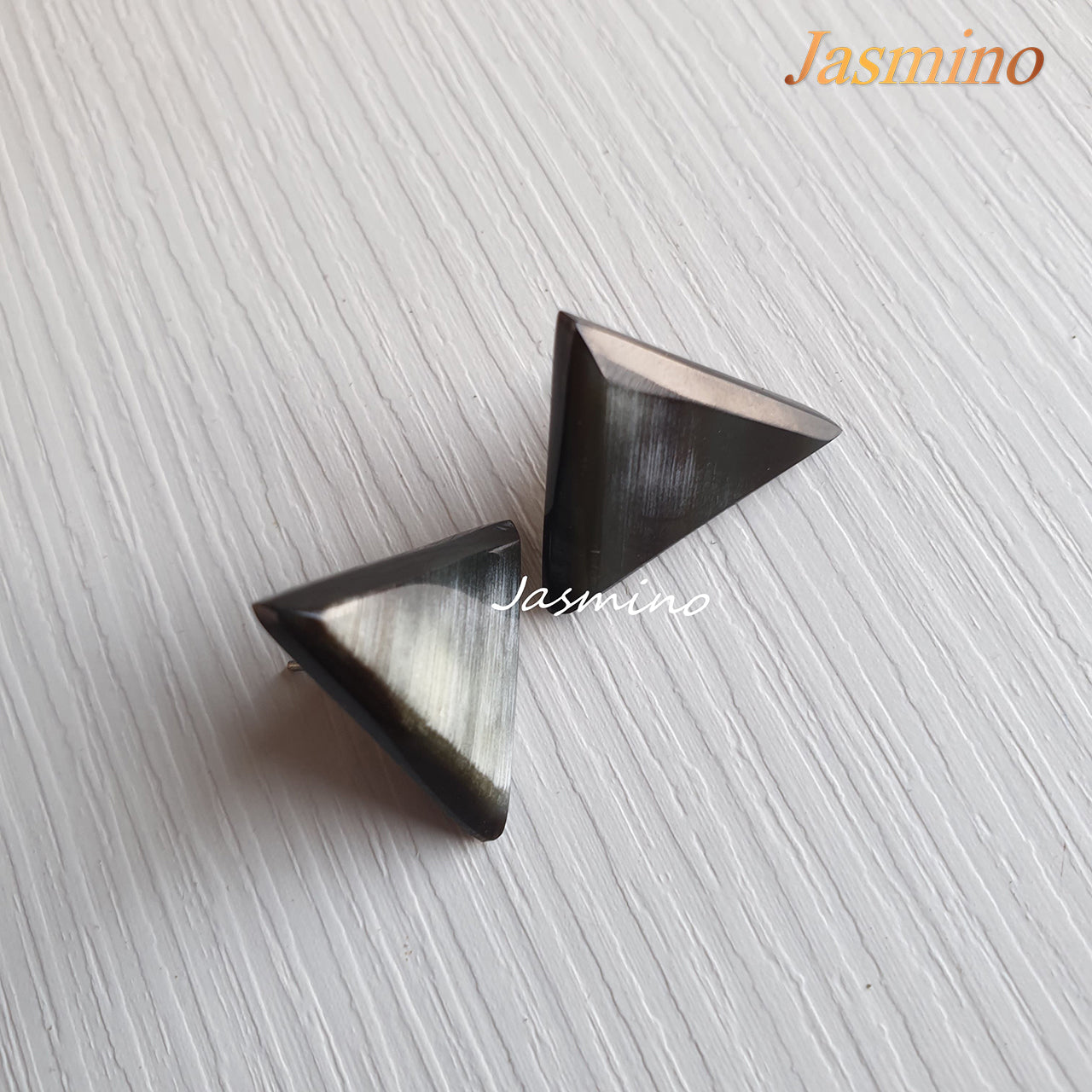 Unique handmade stud earrings feature black and natural buffalo horn, shaped by a triangle for the best gifts for women