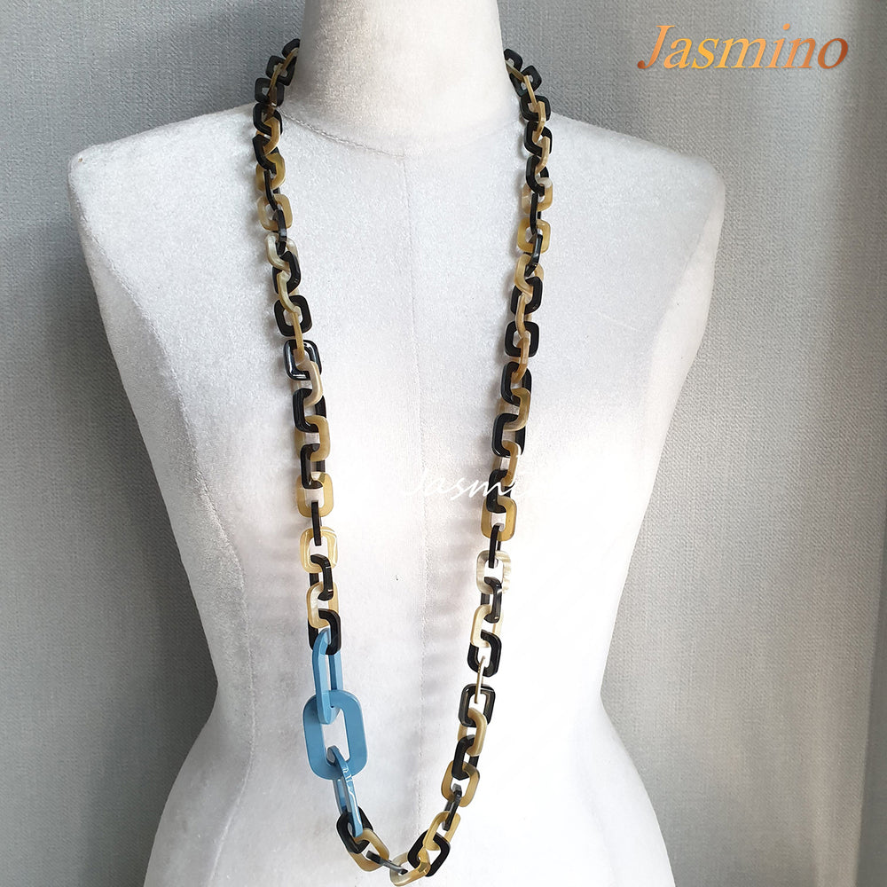 
                  
                    The necklace is made from natural buffalo horn pieces with three big horn pieces are painted sky blue , unique gift for your friend 
                  
                