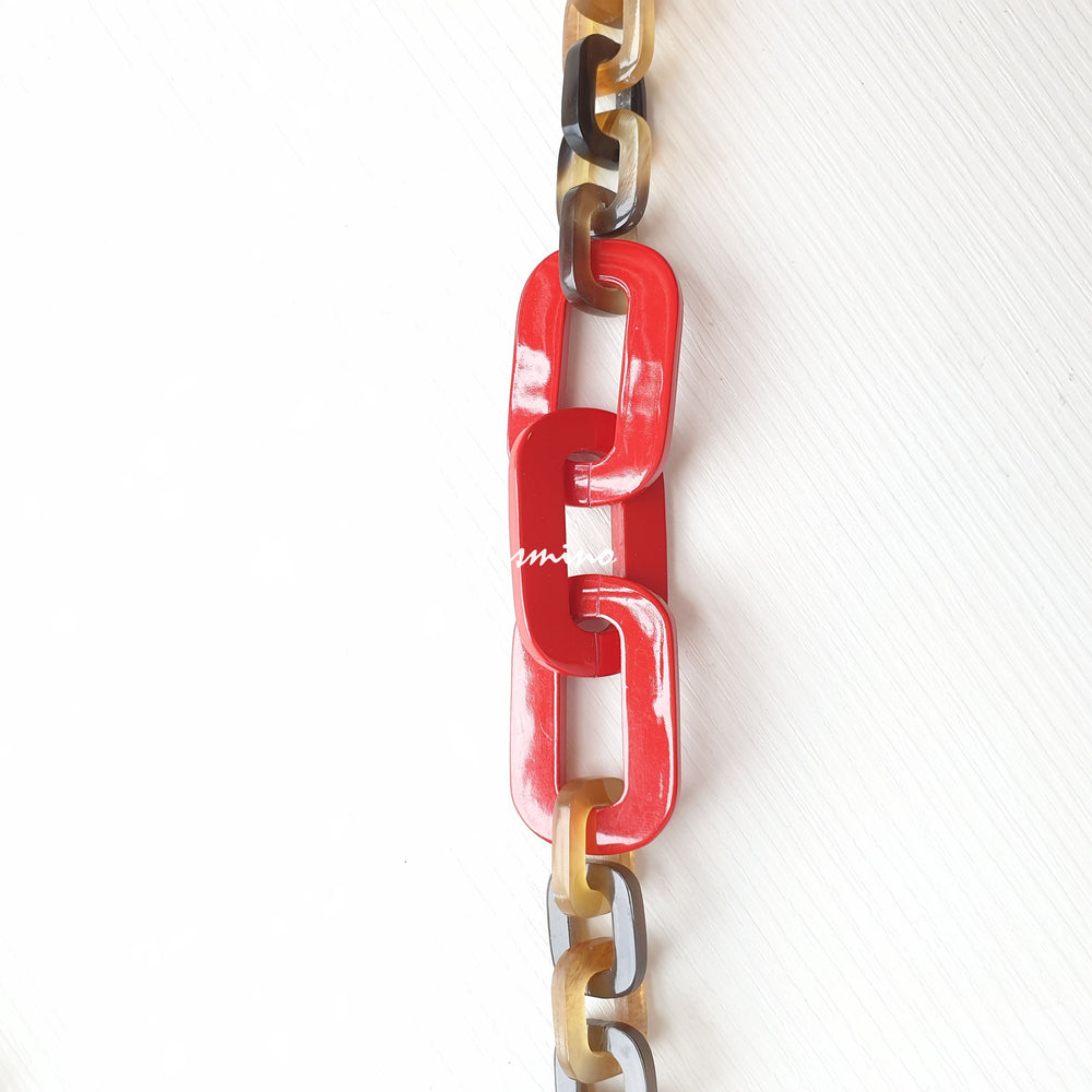 
                  
                    The necklace is made from natural buffalo horn pieces with three big horn pieces are painted orange peel, unique gift for your friend 
                  
                