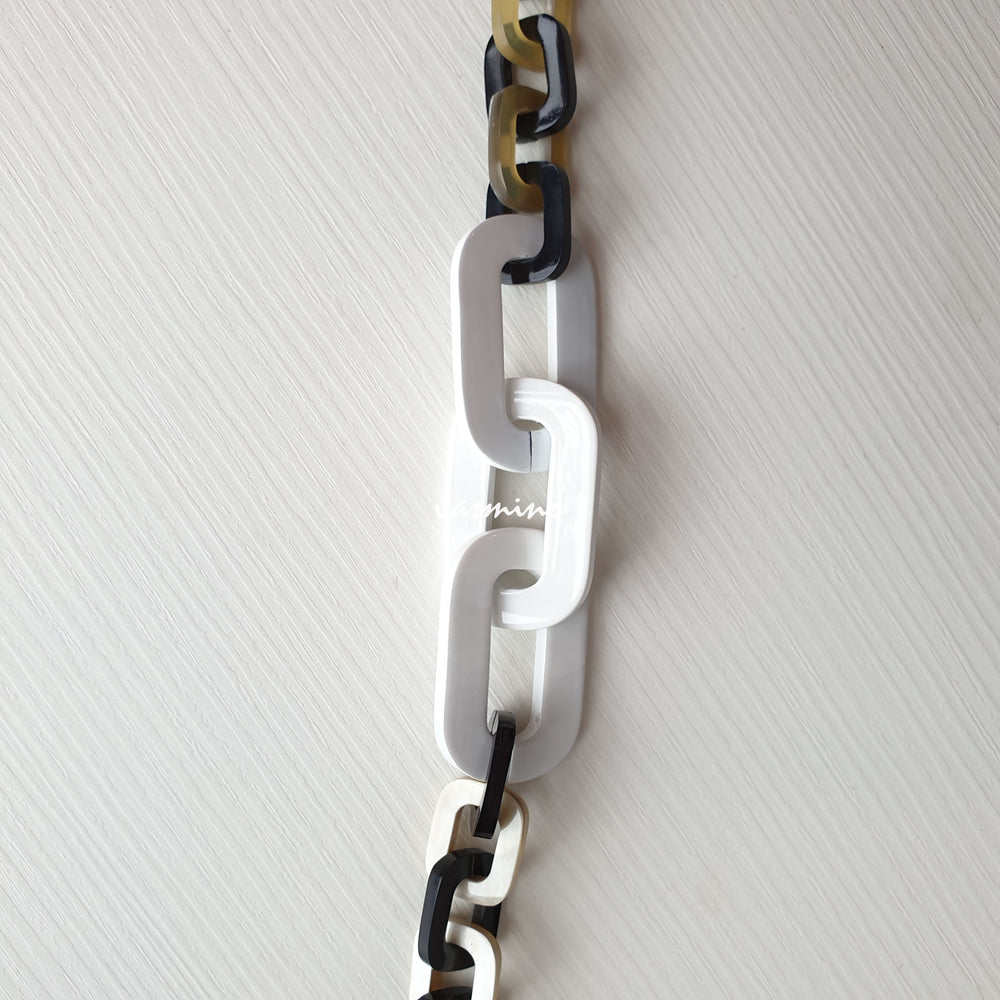 
                  
                    The necklace is made from natural buffalo horn pieces with three big horn pieces are painted brilliant white color, unique gift for your friend
                  
                