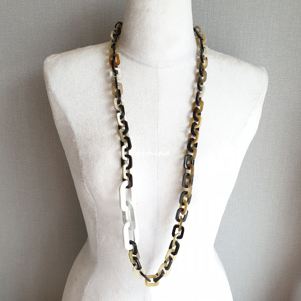 
                  
                    The necklace is made from natural buffalo horn pieces with three big horn pieces are painted brilliant white color, unique gift for your friend
                  
                