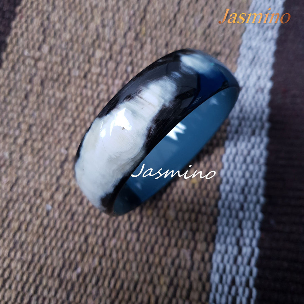 
                  
                    Buffalo horn bangle with half natural horn and half painted cadet blue on the light background, impressive gift for her
                  
                