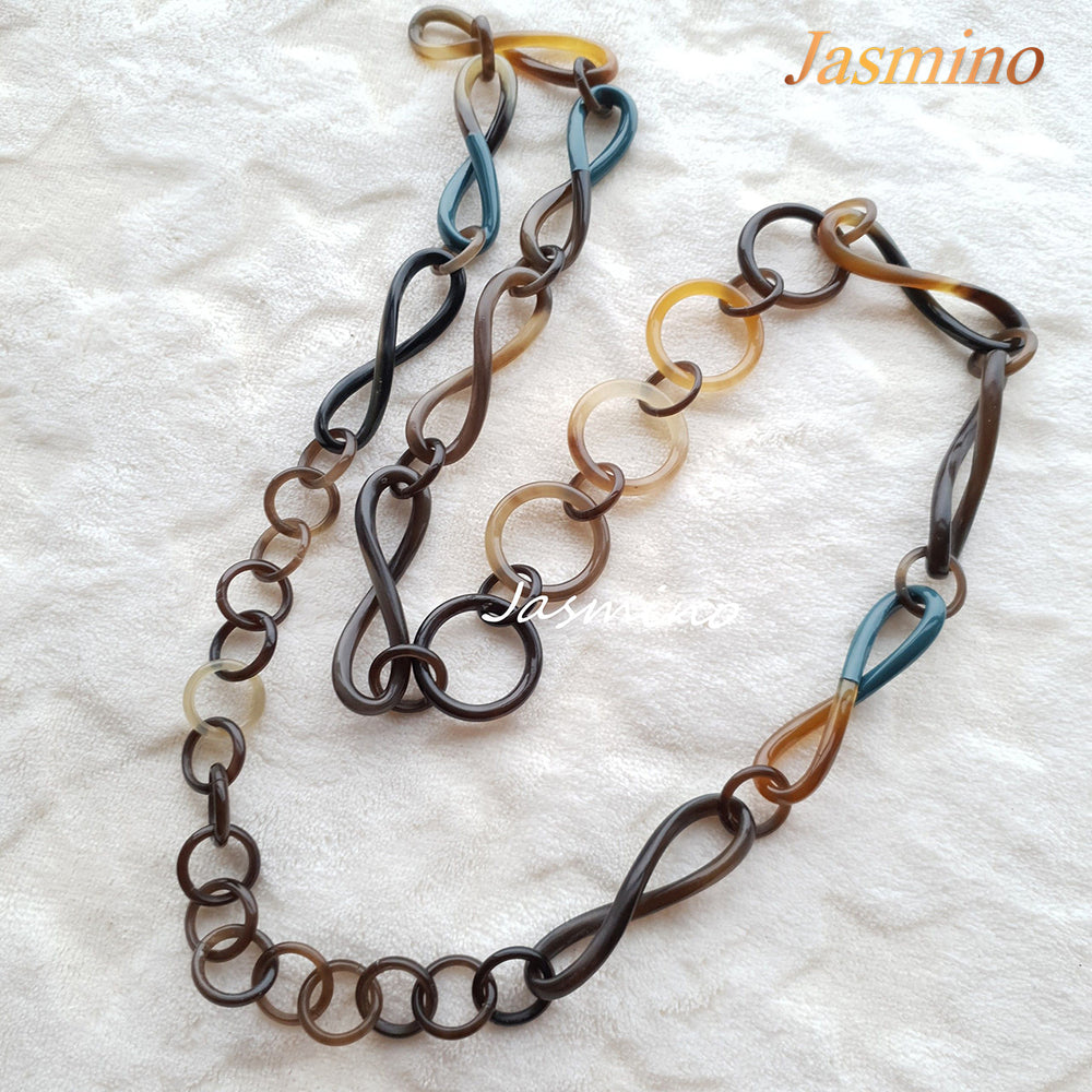 
                  
                    The necklace has links with half natural horn and half cadet blue lacquer, unique gift for her
                  
                