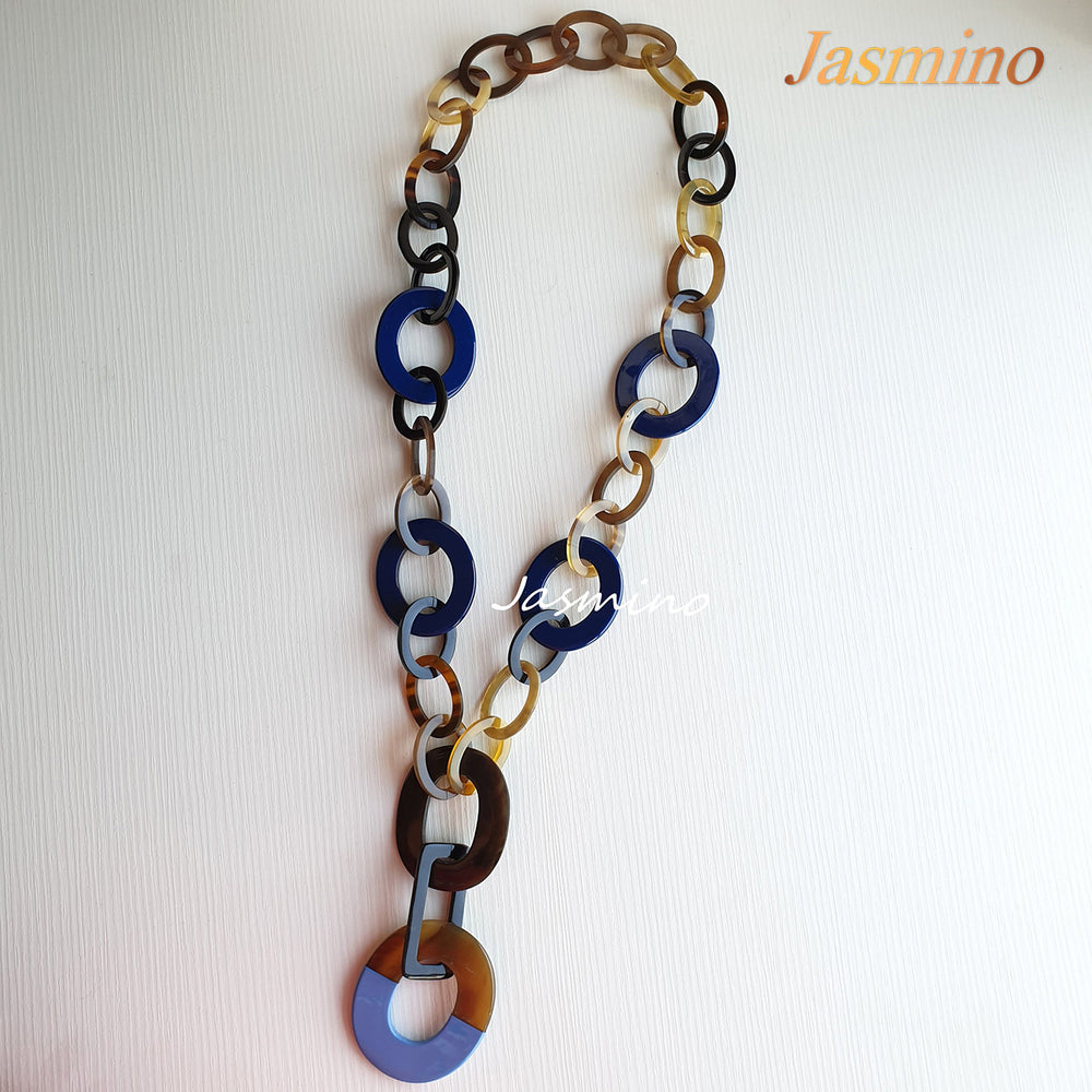 The necklace has a large piece with half natural horn and half demin lacquer on the bottom, unique gift for her