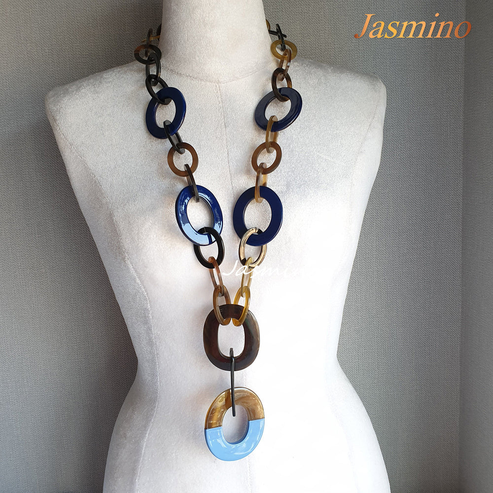The necklace has a large piece with half natural horn and half demin lacquer on the bottom, unique gift for her