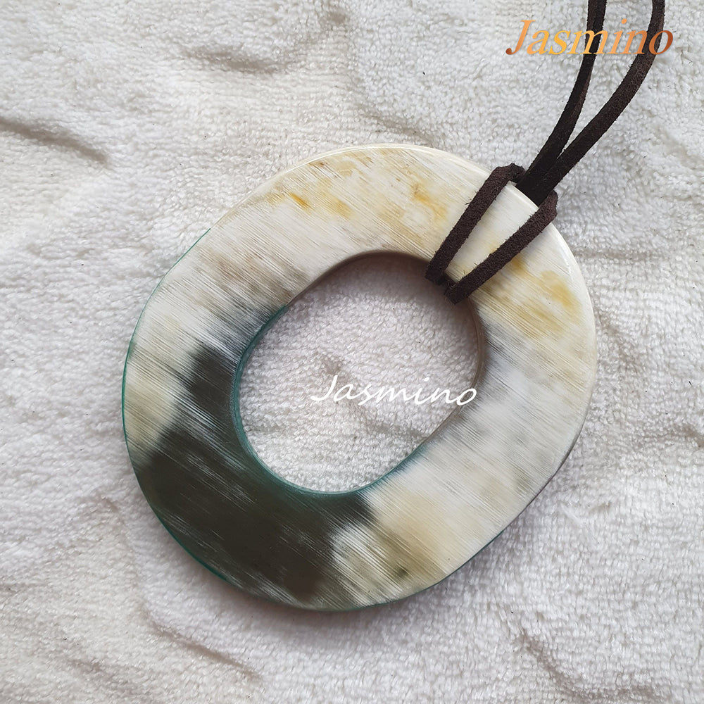 
                  
                    unique handmade Vintage oval pendants feature white that are made of natural buffalo horn for women
                  
                