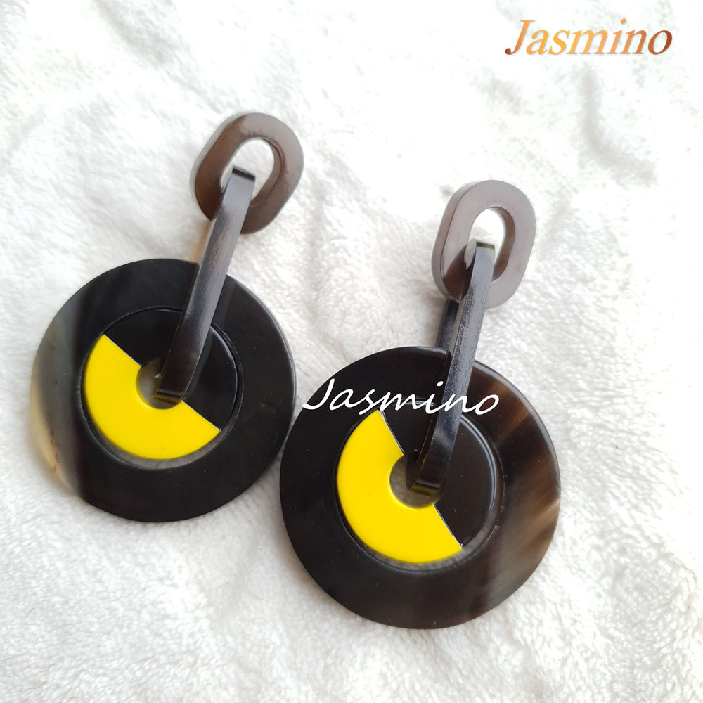 
                  
                    Jasmino Unique Tire Drop Earrings For Men And Women Featured Black And Yellow
                  
                