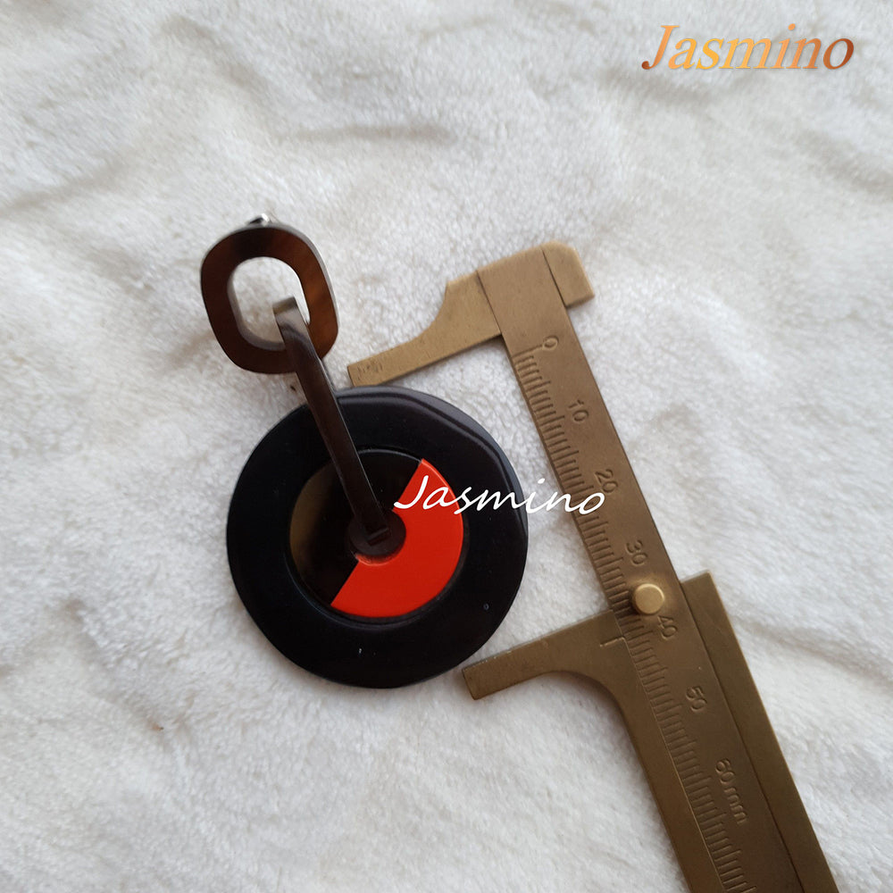 
                  
                    Jasmino Unique Tire Drop Earrings For Men And Women Featured Black And Burnt Orange
                  
                