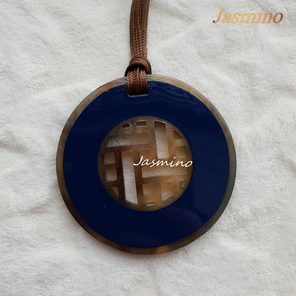 
                  
                    circle classic blue buffalo horn pendant 8cm on the light background, impressive gift for her
                  
                