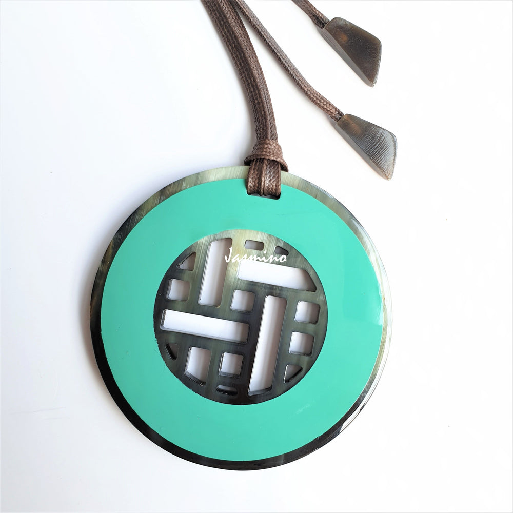 
                  
                    unique handmade Asian circle pendant features turquoise that is made of natural buffalo horn for women's gifts
                  
                