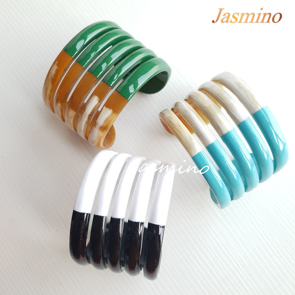 
                  
                    A set of three Jasmino unique handmade Minimalist Vintage fivefold cuff bracelets in natural buffalo horn for women's gifts and best friends
                  
                