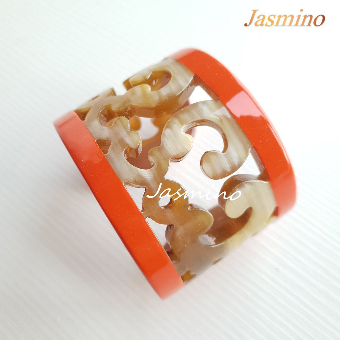 unique handmade Vintage cuff bracelet has a central orange engraving with orange in natural buffalo horn for women on Thanksgiving