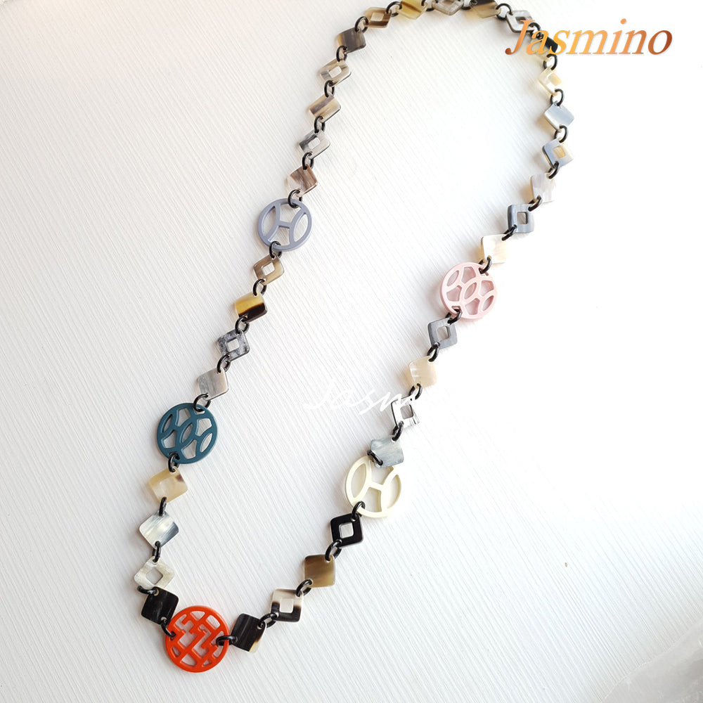 The necklace has large pieces with different patterns and colors , unique gift for her