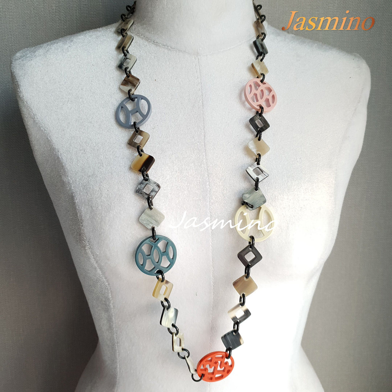 The necklace has large pieces with different patterns and colors , unique gift for her