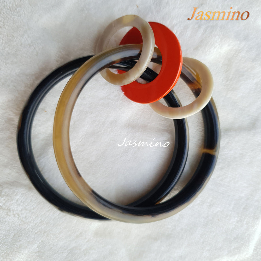 
                  
                    Jasmino unique handmade Bohemian Vintage double circle thin bracelet is detailed by three bright small circles in natural buffalo horn for women's gifts
                  
                