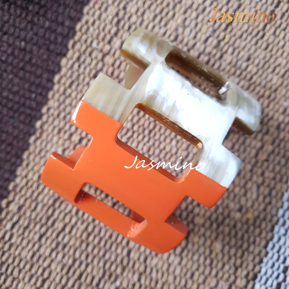 unique bracelet is designed with half natural buffalo horn and half painted orange peel in natural light, an impressive gift for her