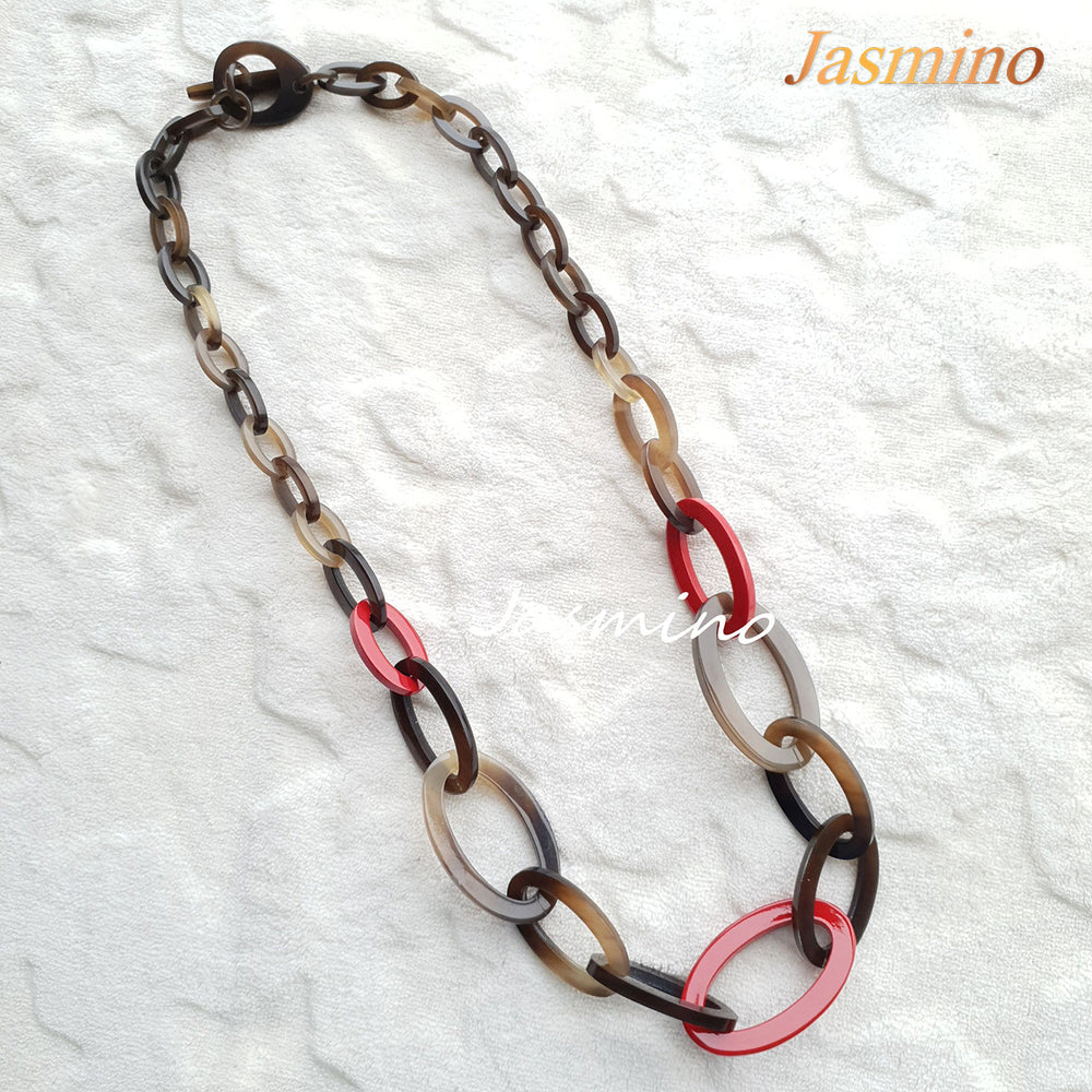 
                  
                    The necklace has several flame scarlet pieces in natural light, impressive gift for her
                  
                