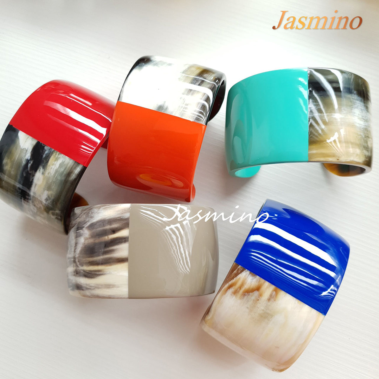 A set of unique handmade Minimalist cuff bracelets in natural buffalo horn for women