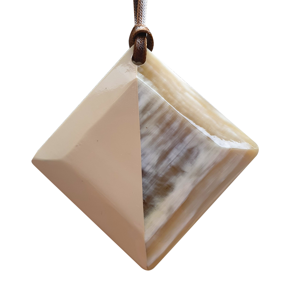 
                  
                    lozenge pendant with half natural horn and half painted beige on the light background, impressive gift for her
                  
                