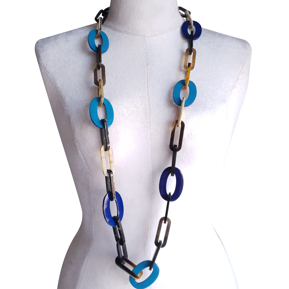 The necklace has several large sky blue and classic blue pieces in natural light, impressive gift for her