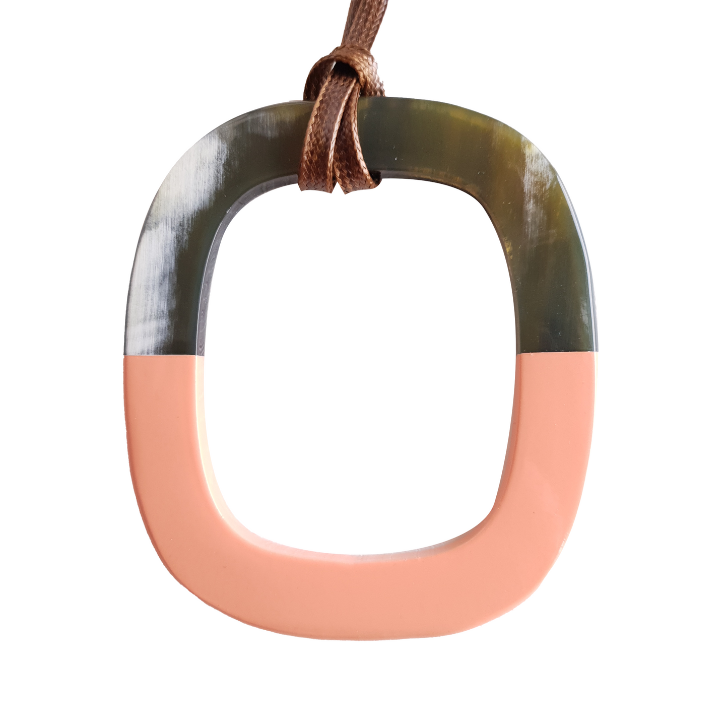 coral pink lacquer pendant on the light background, impressive gift for her