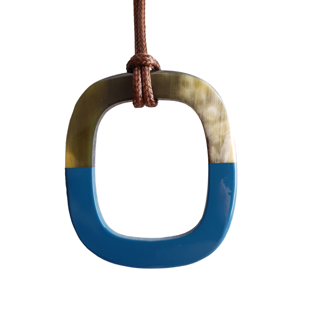 
                  
                    pendant is designed with the top half of a natural buffalo horn and the bottom half is painted cadet blue, unique gift for her
                  
                