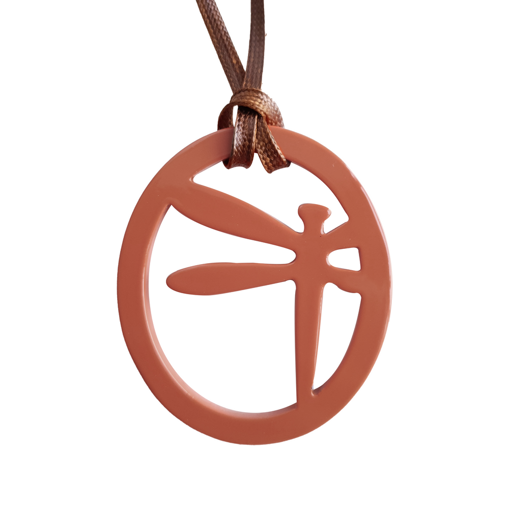 
                  
                    elliptical lark pendant with dragonfly pattern inside on the light background, impressive gift for her
                  
                