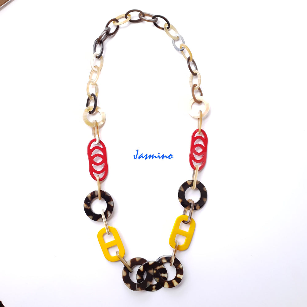 
                  
                    The necklace has several large flame scarlet and vibrant yellow pieces in natural light, impressive gift for her
                  
                