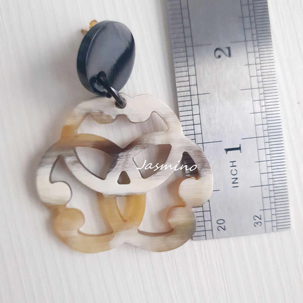 
                  
                    Floral bridal drop earrings feature white that are unique gifts for her
                  
                