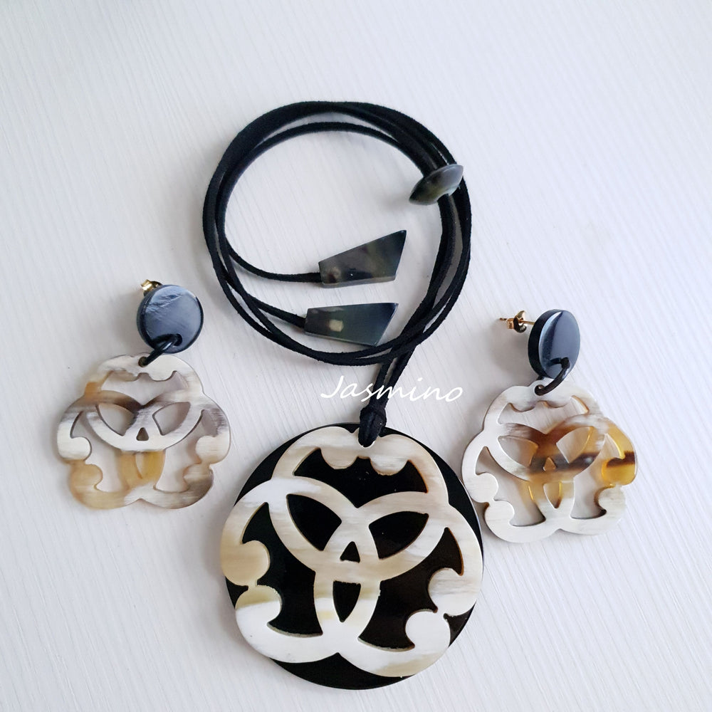
                  
                    A set of one floral bridal necklace and two earrings features white as an affordable gift
                  
                