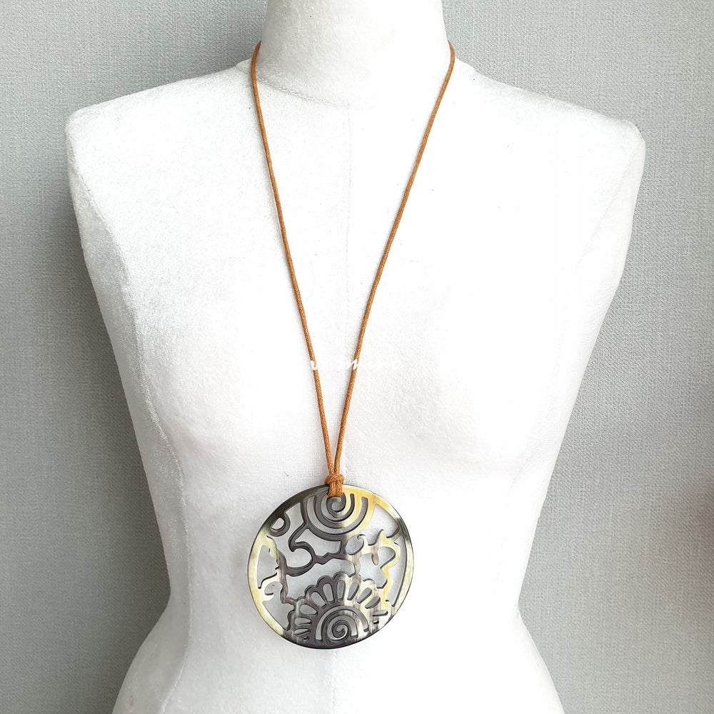 
                  
                    unique circular darker buffalo horn pendant on the light background- 8cm, impressive gift for her
                  
                