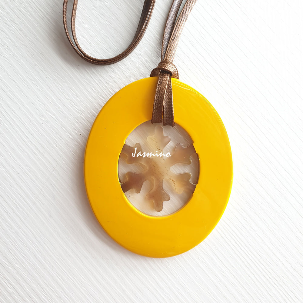 
                  
                    unique handmade Vintage oval pendant is detailed by snowflake in natural buffalo horn
                  
                