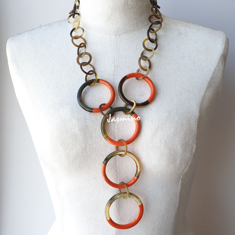 
                  
                    unique handmade Bohemian circle chain link necklace jewelry features orange in natural buffalo horn
                  
                