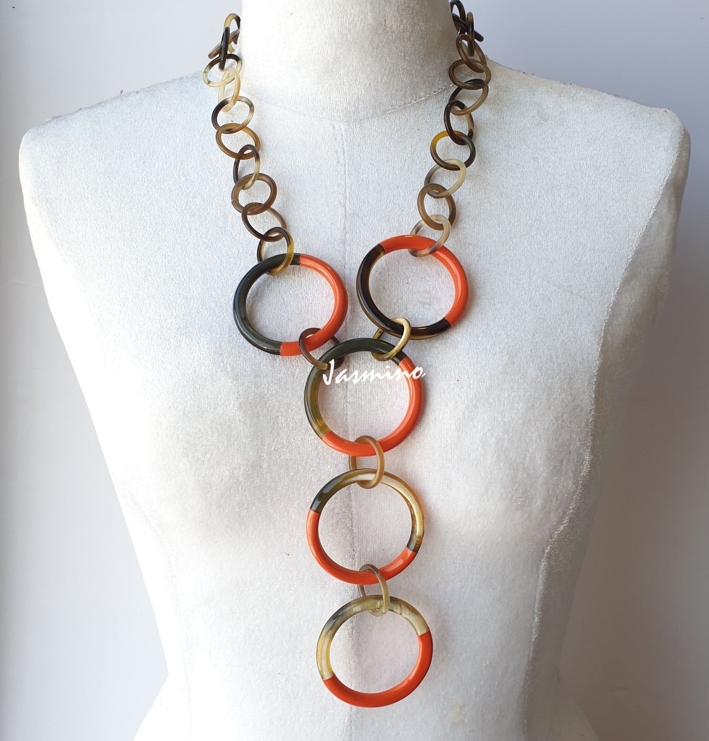 unique handmade Bohemian circle chain link necklace jewelry features orange in natural buffalo horn