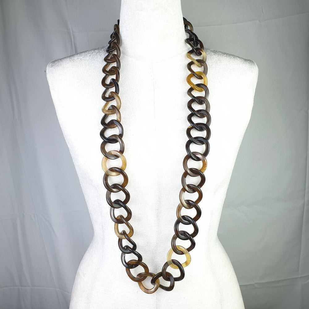 
                  
                    Jasmino unique handmade Bohemian Vintage chain link necklace features brown and yellow in natural buffalo horn for men and women
                  
                