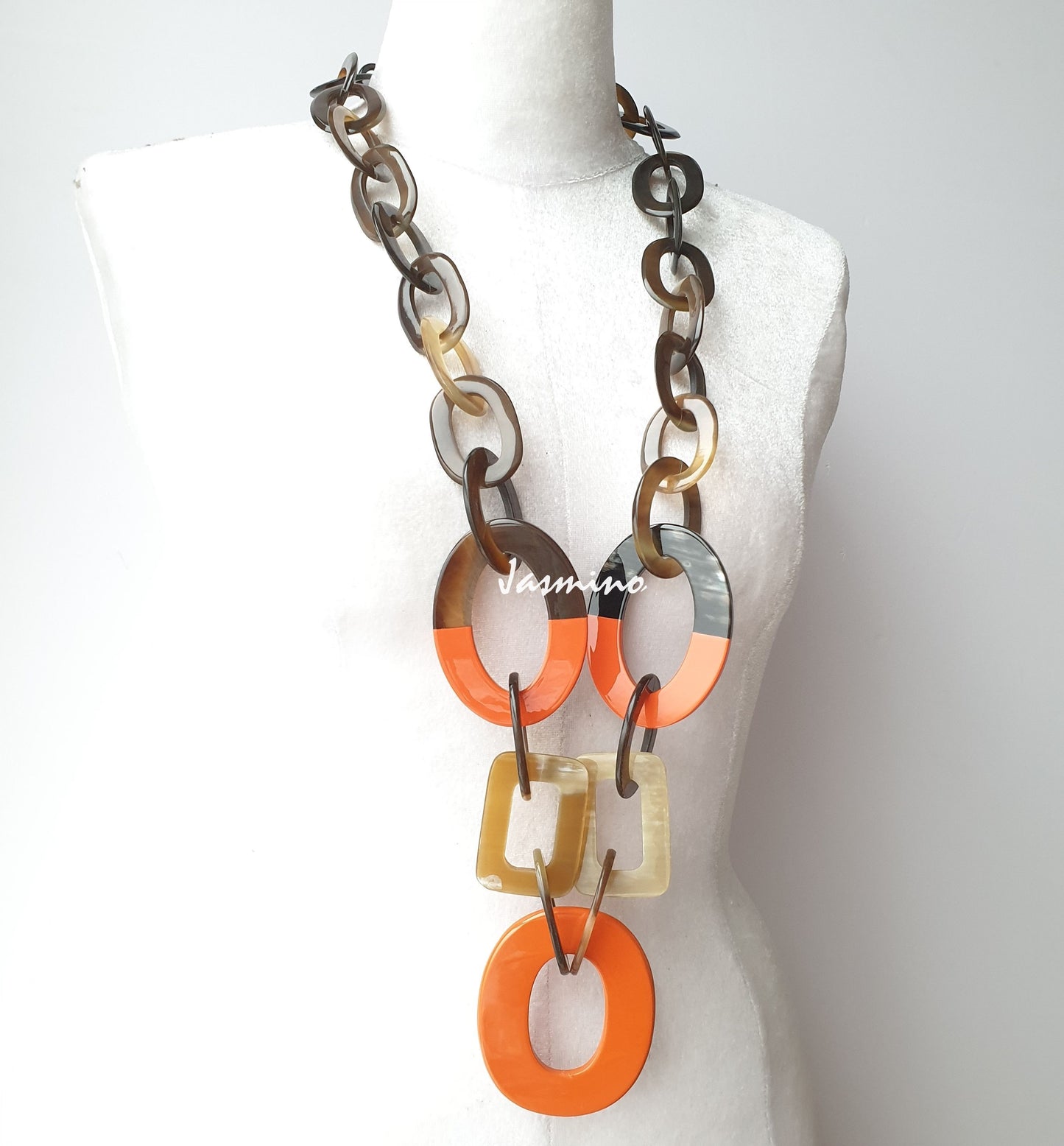 unique handmade Bohemian large chain link necklace accessory features brow and orange in natural buffalo horn