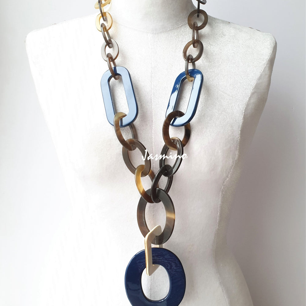 unique handmade large circle chain link necklace accessory features a blue circle at the bottom in natural buffalo horn