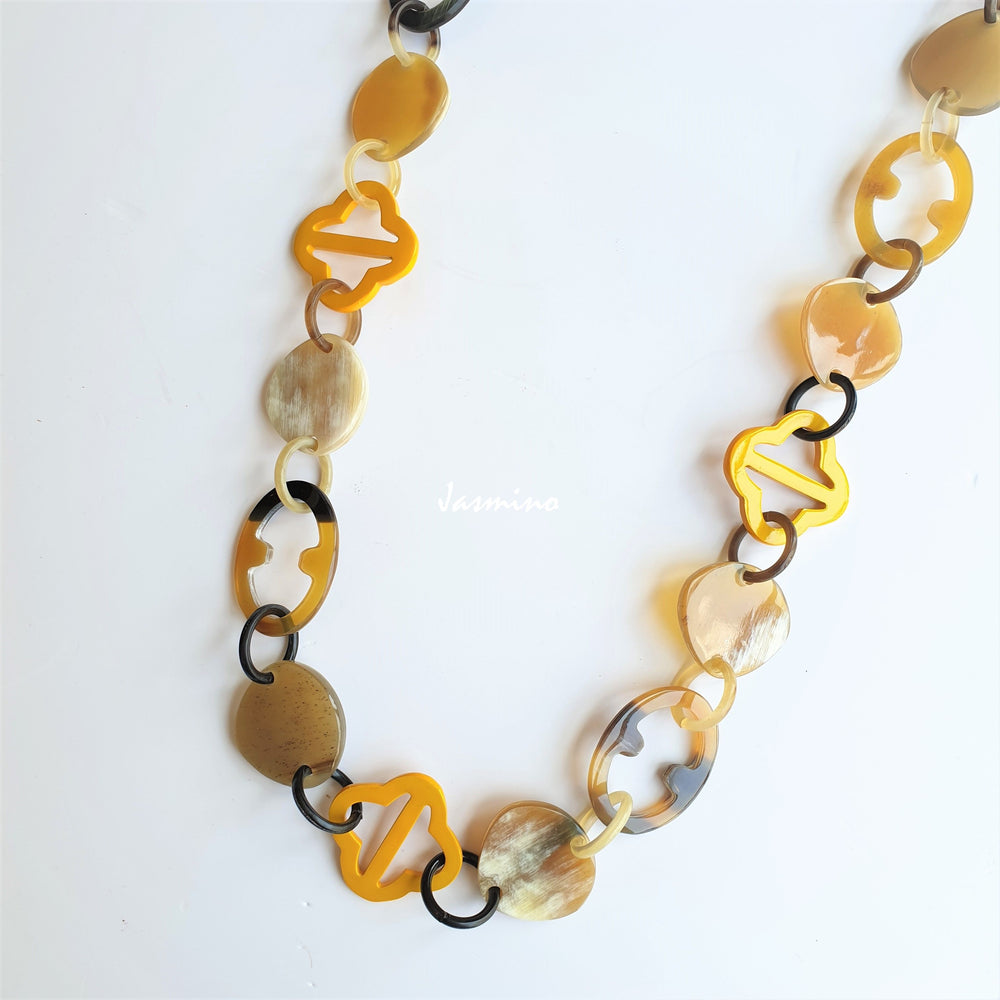 
                  
                    unique handmade Vintage chain link necklace accessory features yellow in natural buffalo horn
                  
                