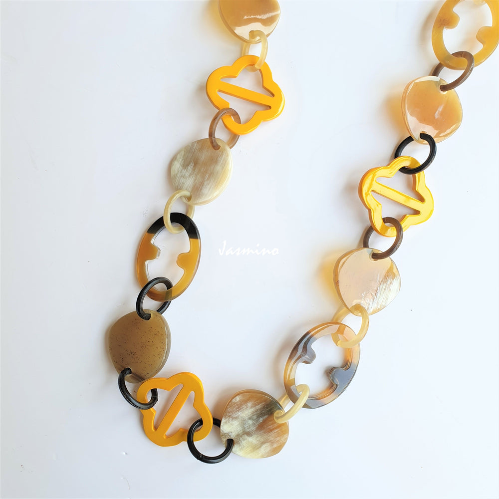 
                  
                    unique handmade Vintage chain link necklace accessory features yellow in natural buffalo horn
                  
                
