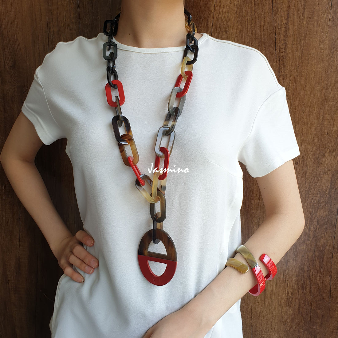 unique handmade Bohemian rectangle chain link necklace accessory has a D-shaped red pendant in natural buffalo horn on Christmas 