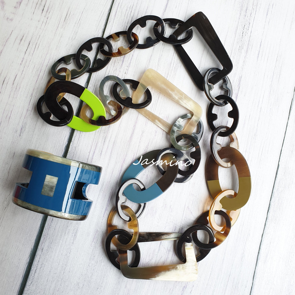 
                  
                    A set of Jasmino unique handmade chain link necklace and bangle bracelet in natural buffalo horn
                  
                