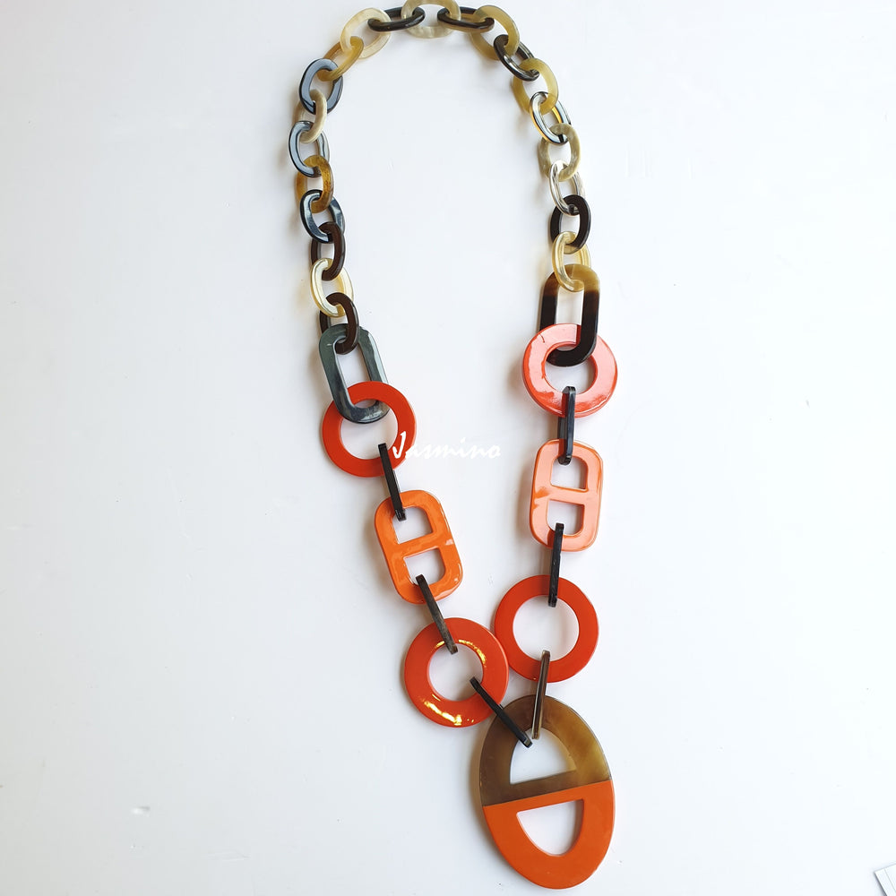 
                  
                    Jasmino unique handmade Bohemian chain link necklace features red and orange in natural buffalo horn for women on Thanksgiving
                  
                