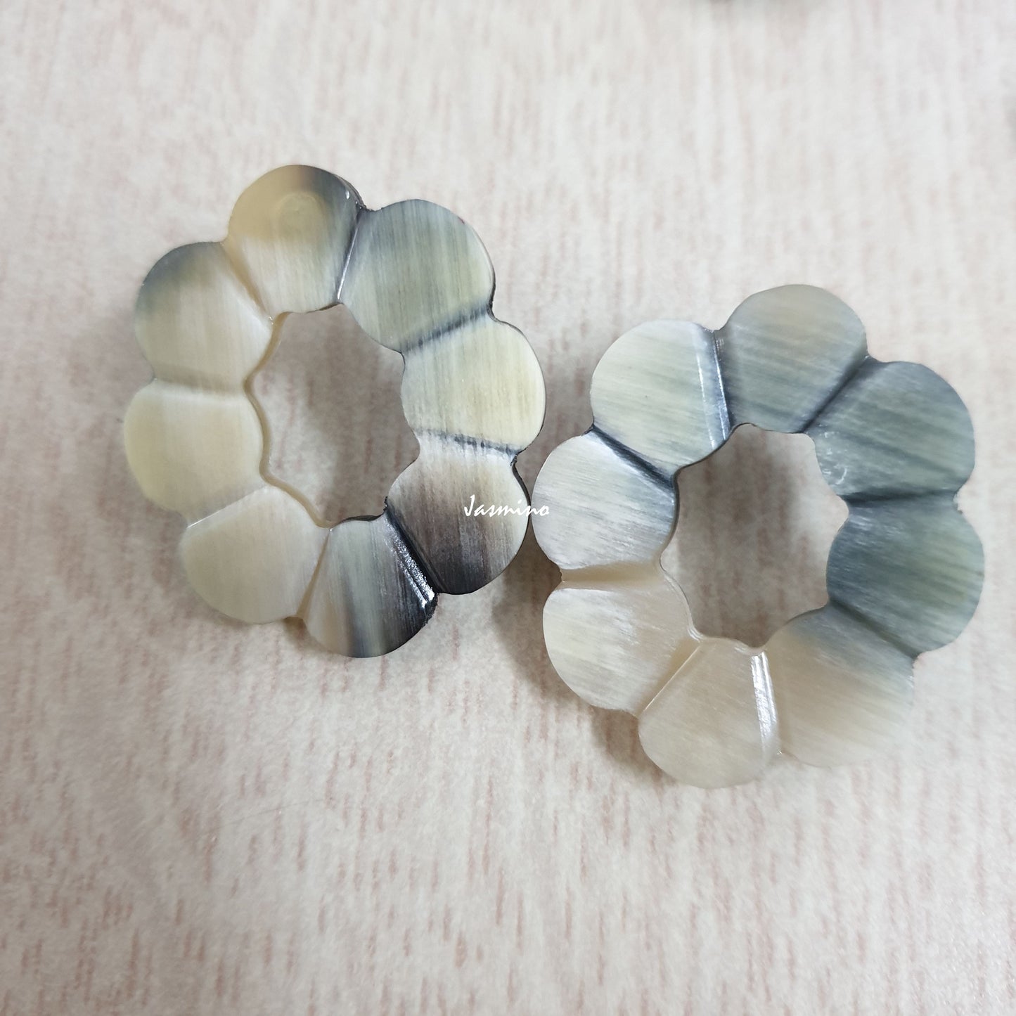 <img src = "buffalo horns.jpg" alt = "natural horn flower-shaped earrings on a light background, an impressive gift for her">