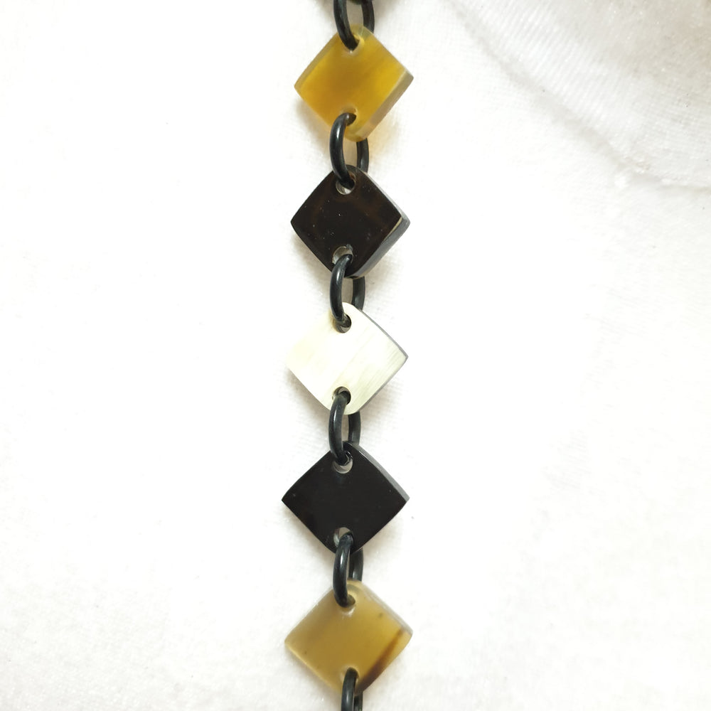 
                  
                    This necklace has several red pieces with unique pattern on the light background, unique gift for your friend
                  
                