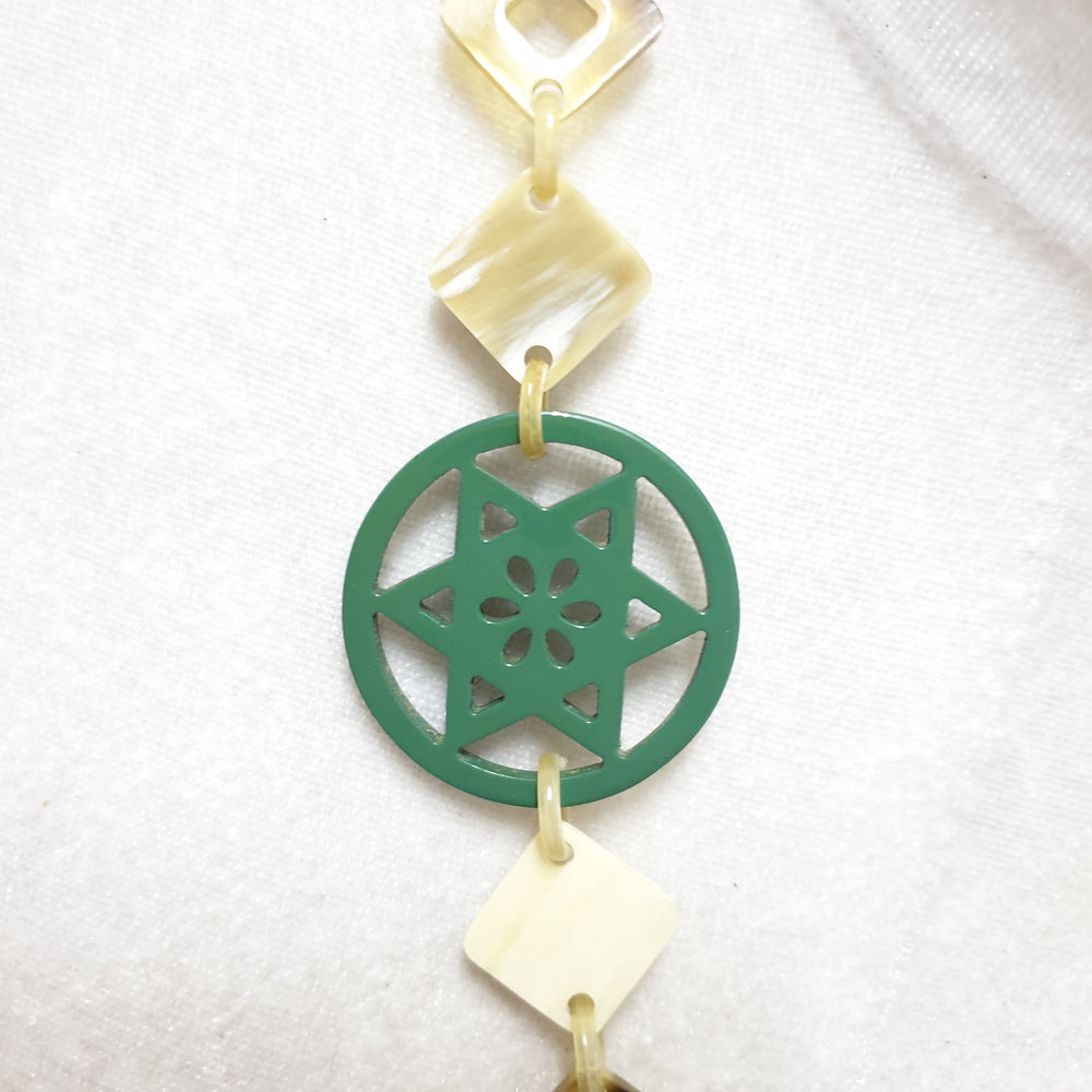 
                  
                    unique handmade Christmas diamond shaped necklace jewelry features green and white in natural buffalo horn
                  
                