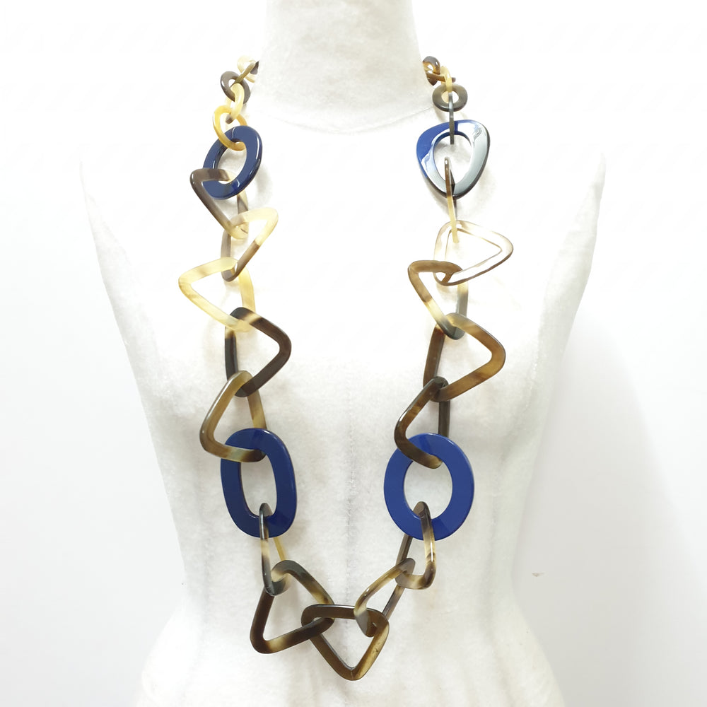 
                  
                    The necklace has some large pieces of classic blue lacquer on a light background, a unique gift for your friend
                  
                