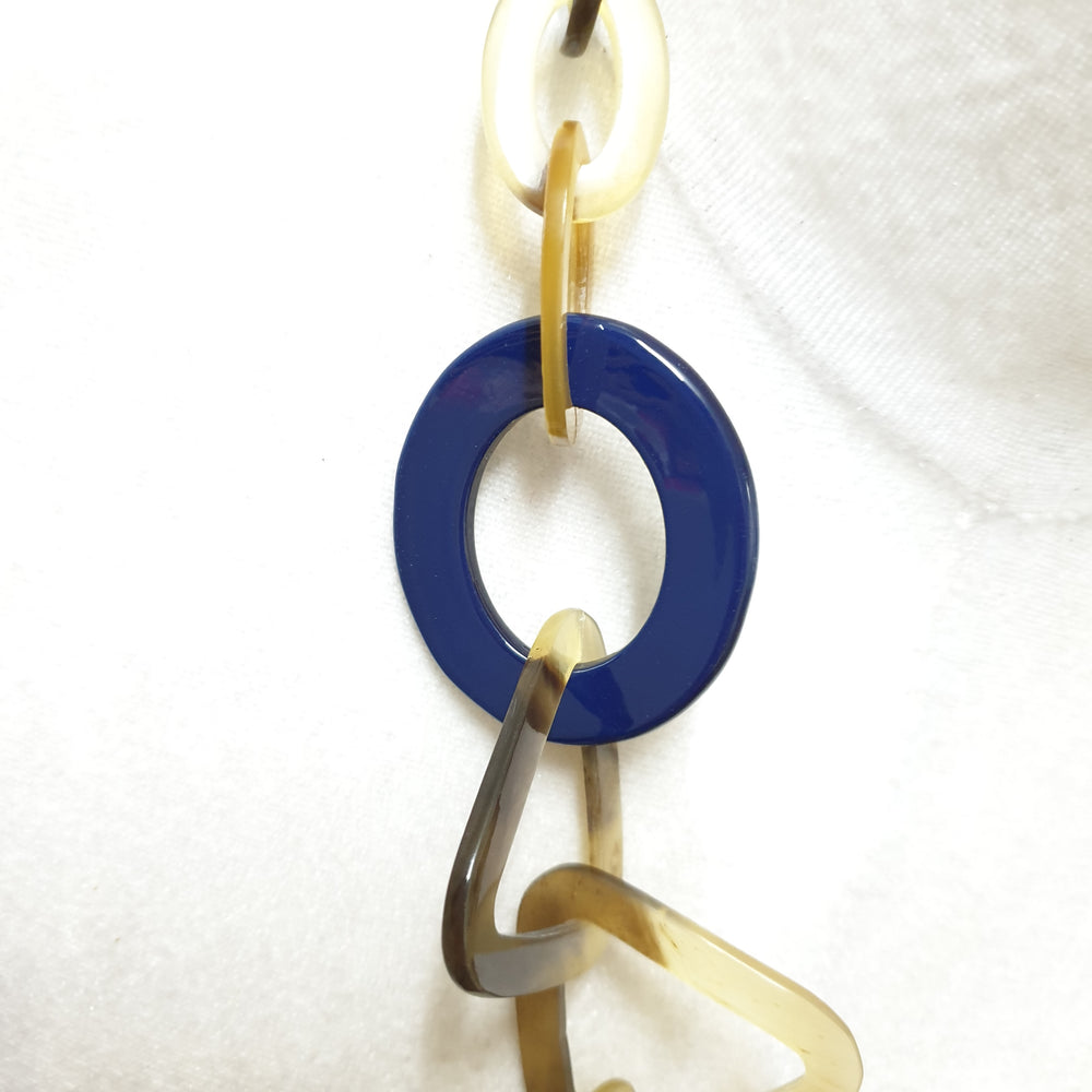
                  
                    The necklace has some large pieces of classic blue lacquer on a light background, a unique gift for your friend
                  
                