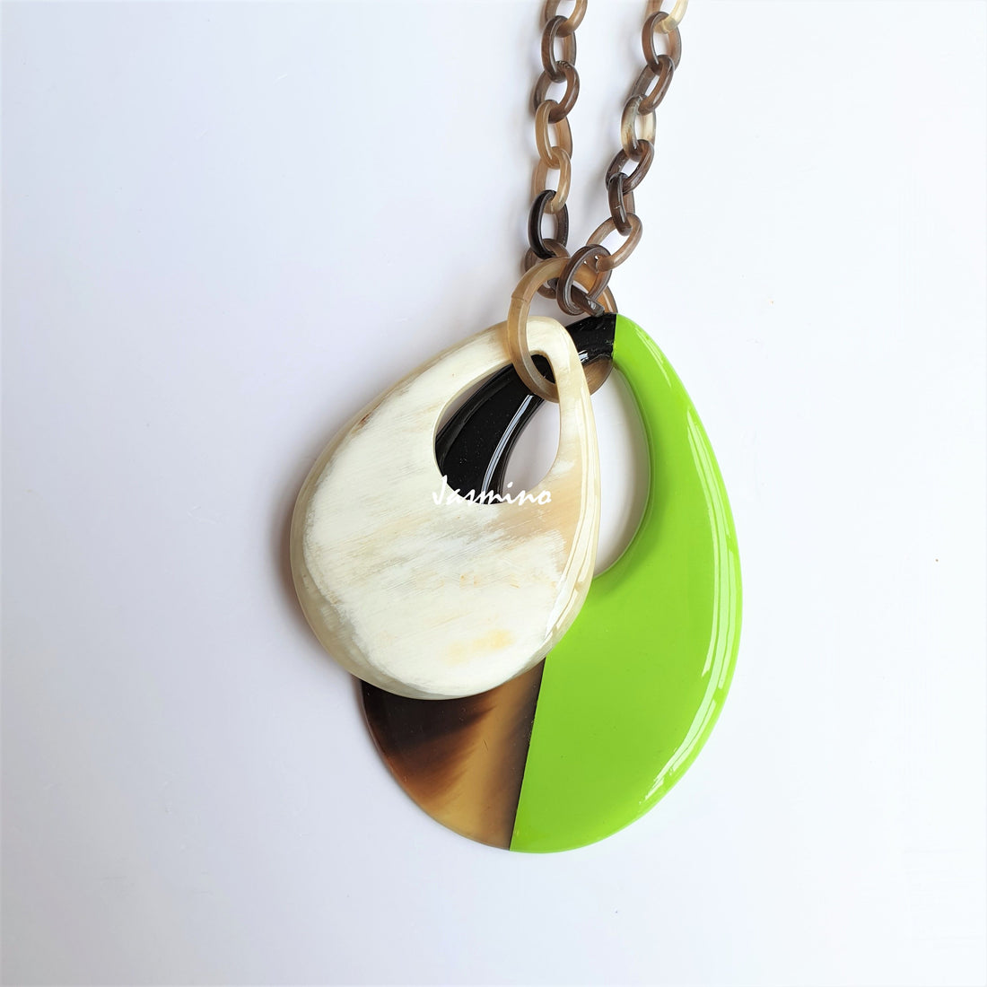 Handmade Vintage double teardrop pendant features a green and white colour made of natural buffalo horn
