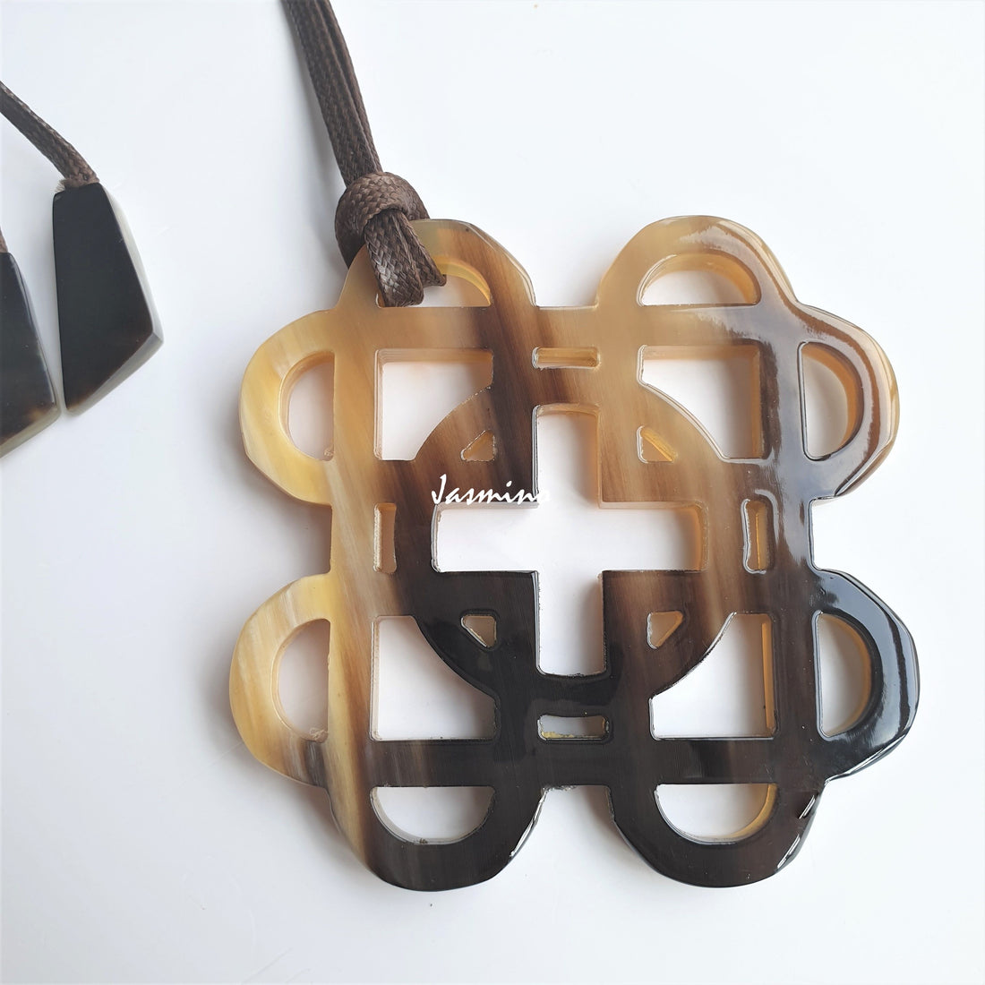 Vintage unique knot square pendant features a brown colour made of natural buffalo horn