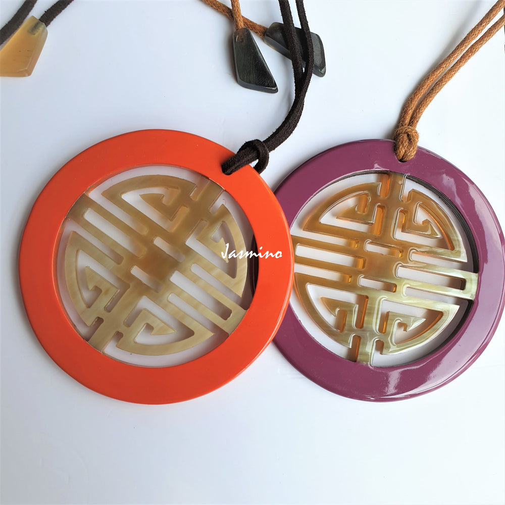 
                  
                    A set of handmade Vintage orange and purple pendant is made of natural buffalo horn
                  
                